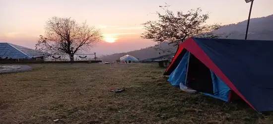Mountain View Tent — exterior at dusk facing the Dhauladhar range