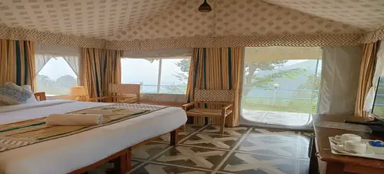 Private Luxury Tent — private deck at golden hour
