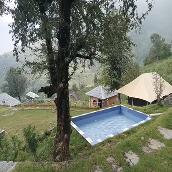 Luxury glamping tent overlooking the Dhauladhar Himalayas in Dharamshala